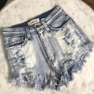 Vibrant MIU high waisted distressed denim shorts